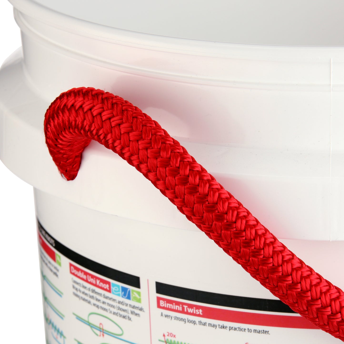 A close-up of the Shurhold Industries, Inc. Fishing and Boating Knots Bucket, a white angler bucket with a red braided rope handle and instructional labels—ideal for your next fishing adventure.