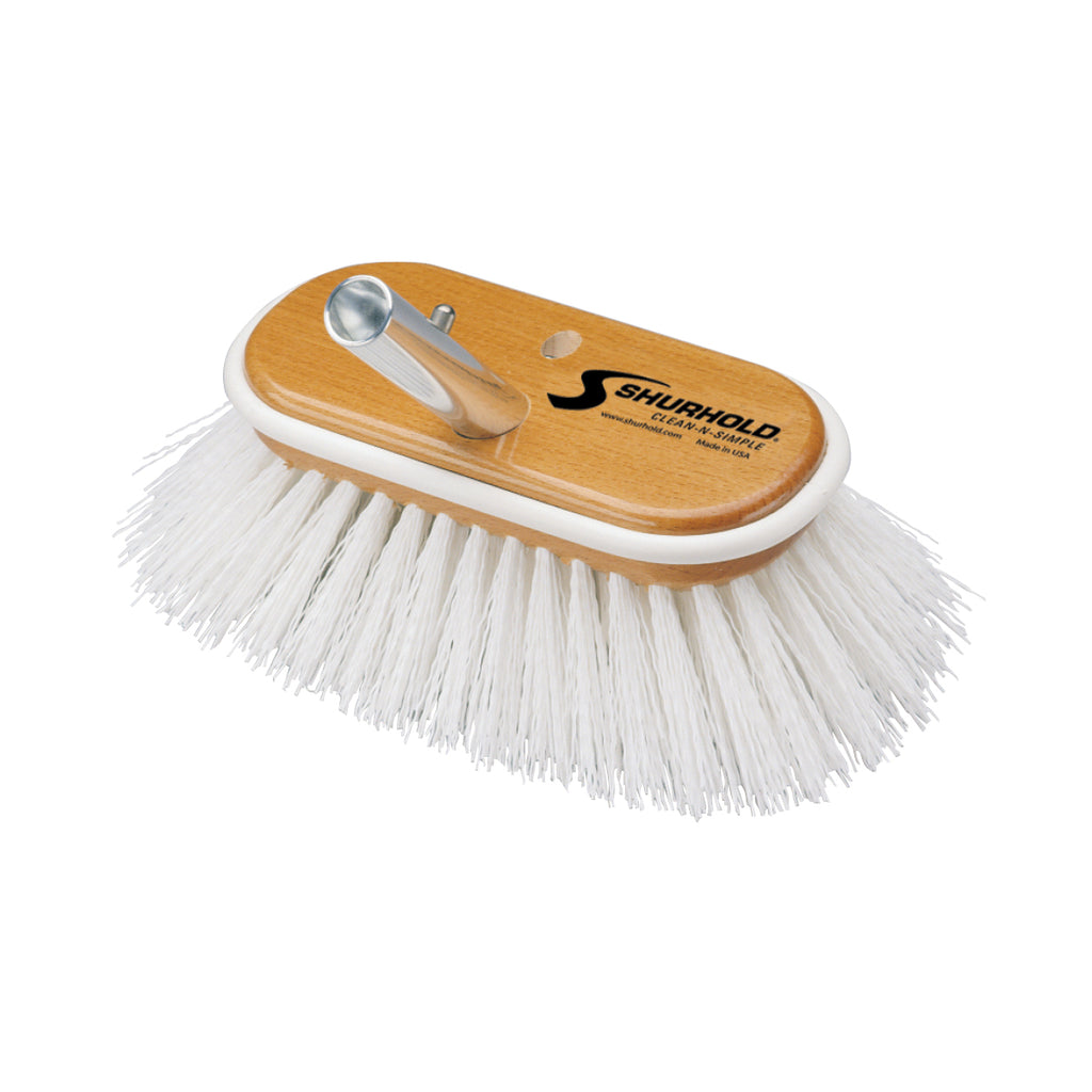 The Classic 6 Inch Deck Brush by Shurhold Industries, Inc. features white cleaning bristles, a durable metal handle socket, and SHURHOLD branding—ideal for keeping your surfaces spotless.