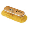 The Classic 10 Inch Deck Brush by Shurhold Industries, Inc. features yellow bristles, a wooden base, metal handle attachment, and the Shurhold logo—ideal for anyone seeking a premium deck cleaning brush.