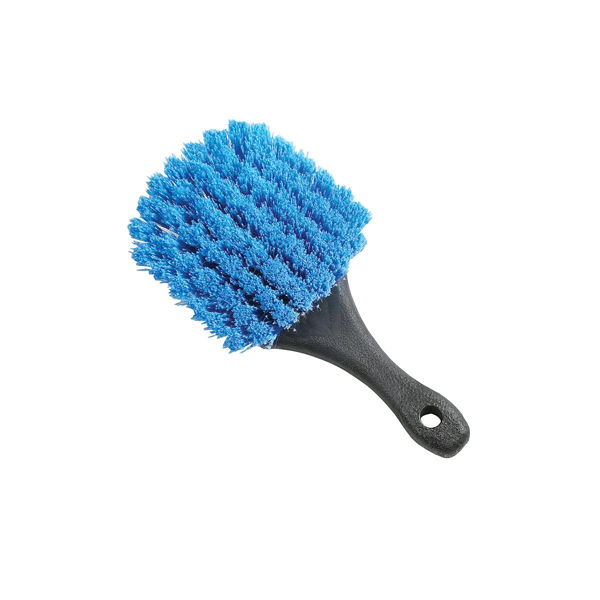 The Shurhold Industries, Inc. Dip And Scrub Brush features a short handle with a black grip and dense, chemical-resistant blue bristles, shown isolated on a white background.