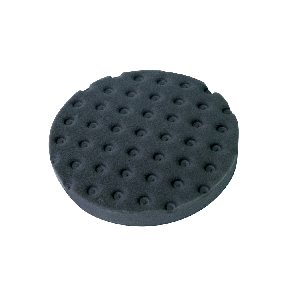 The Shurhold Industries, Inc. Pro Polish Pad is a round black foam pad with raised circular bumps, perfect for use with a Dual Action Polisher to wax and polish your vehicle for a smooth finish.