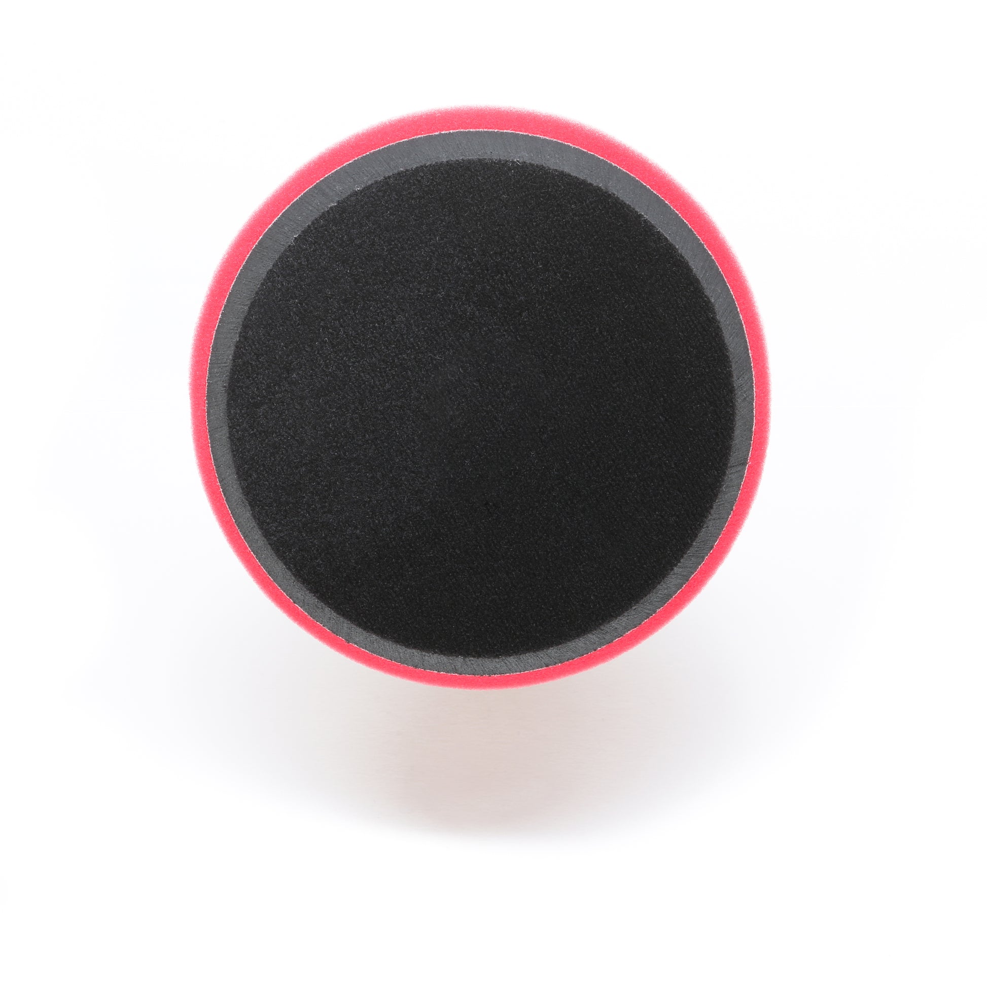 The Pro Polish Pad for DAP PRO by Shurhold Industries, Inc. is a 7 foam pad featuring a black center and red edge—perfect for polishing and waxing with the Shurhold Dual Action Polisher PRO.