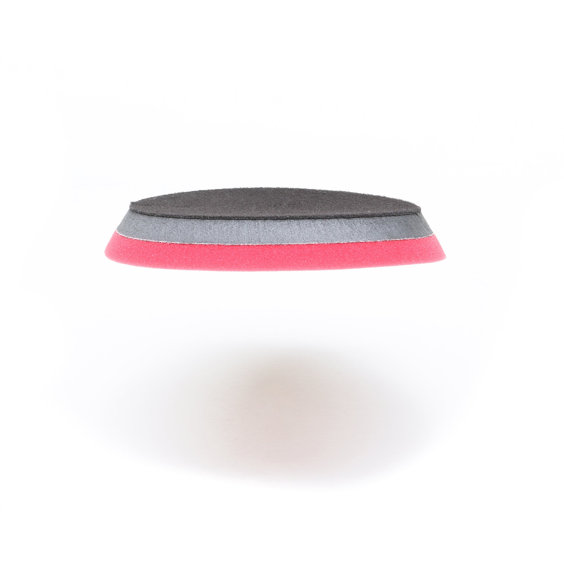 The Shurhold Industries, Inc. Pro Polish Pad for DAP PRO is a round, layered 7 foam pad with black, gray, and red sections for polishing and waxing, shown against a white background.