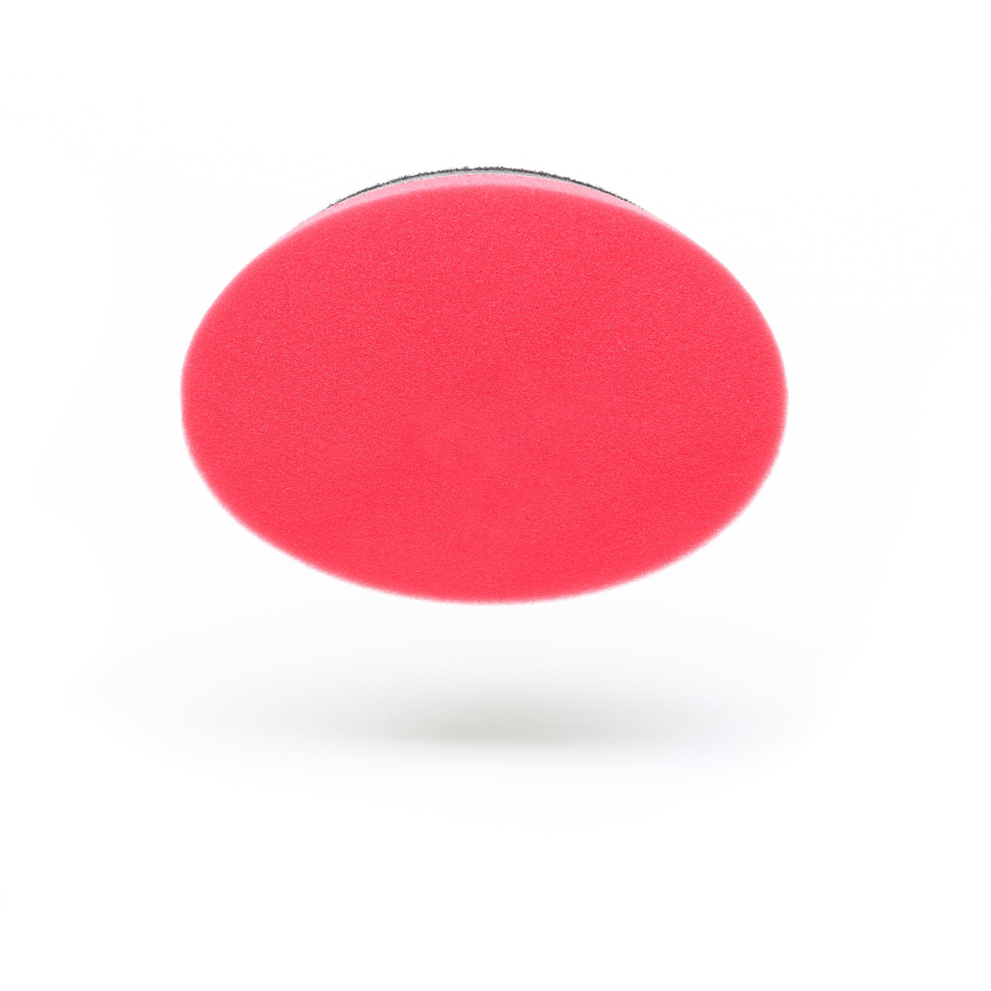 The Pro Polish Pad for DAP PRO by Shurhold Industries, Inc. is a round 7 red foam pad with a black edge, perfect for polishing and waxing, shown against a white background.
