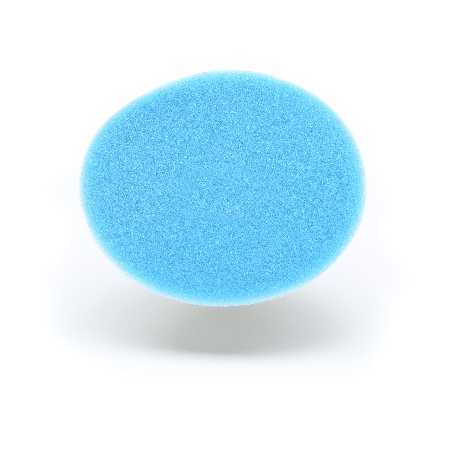 A round blue Buff Magic Heavy Oxidation Pad by Shurhold Industries, Inc. is shown from above on a white background.