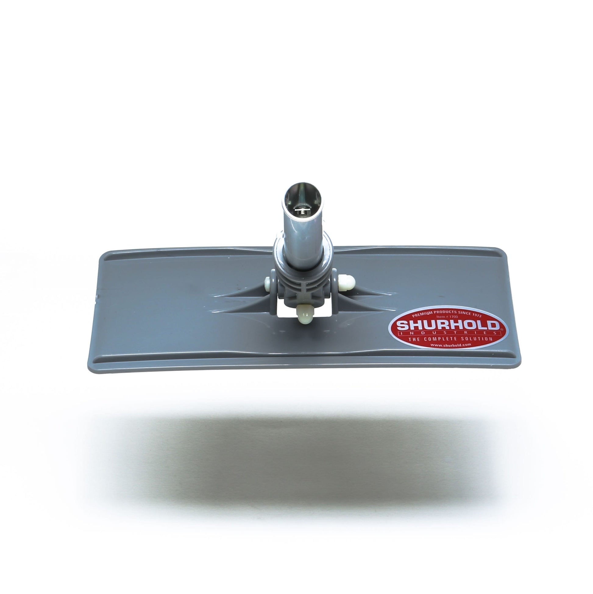 Gray rectangular scrubber pad head with central handle connector and red Shurhold logo, designed for use with the Shurhold Industries, Inc. Swivel Pad Base and other compatible attachments for versatile cleaning tasks.
