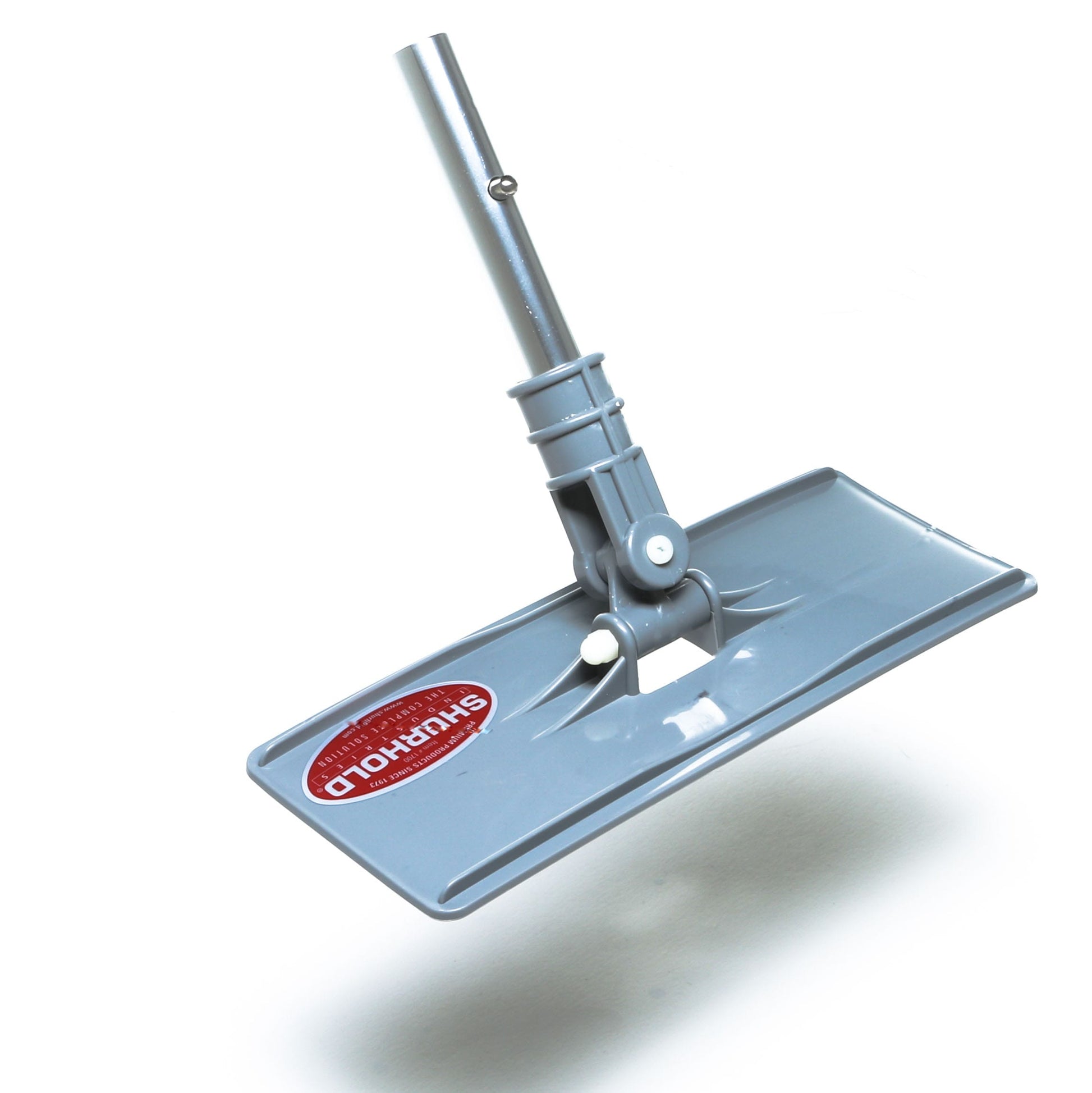 A gray rectangular Swivel Pad Base by Shurhold Industries, Inc., with a metal handle attachment, compatible with Shurhold attachments and scrubber pads, featuring a red label on a white background.