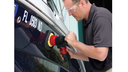 Man waxing with the Shurhold Dual Action Polisher 