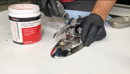 Buff Magic being used to polish a metal cleat 