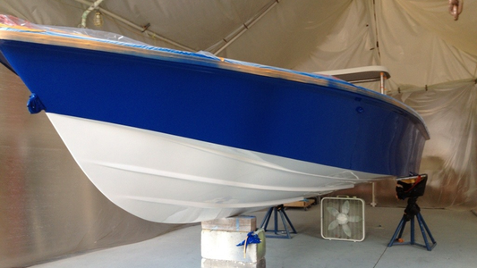 Boat having its hull painted blue