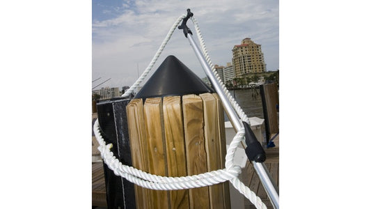 SKU #134 Shurhold Dock-A-Reni being used to place a loop over a piling 