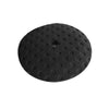A round, black, textured climbing hold with a central bolt hole is displayed on a white background, resembling the polished finish produced by the Shurhold Industries, Inc. Pro Rotary Polish Pad during surface polishing and waxing.