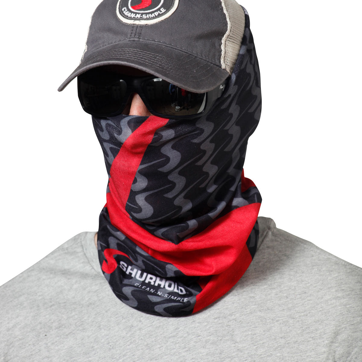 Man wearing black and red bandanna around face