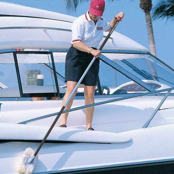 Handle Mate PFD being used while cleaning a boat