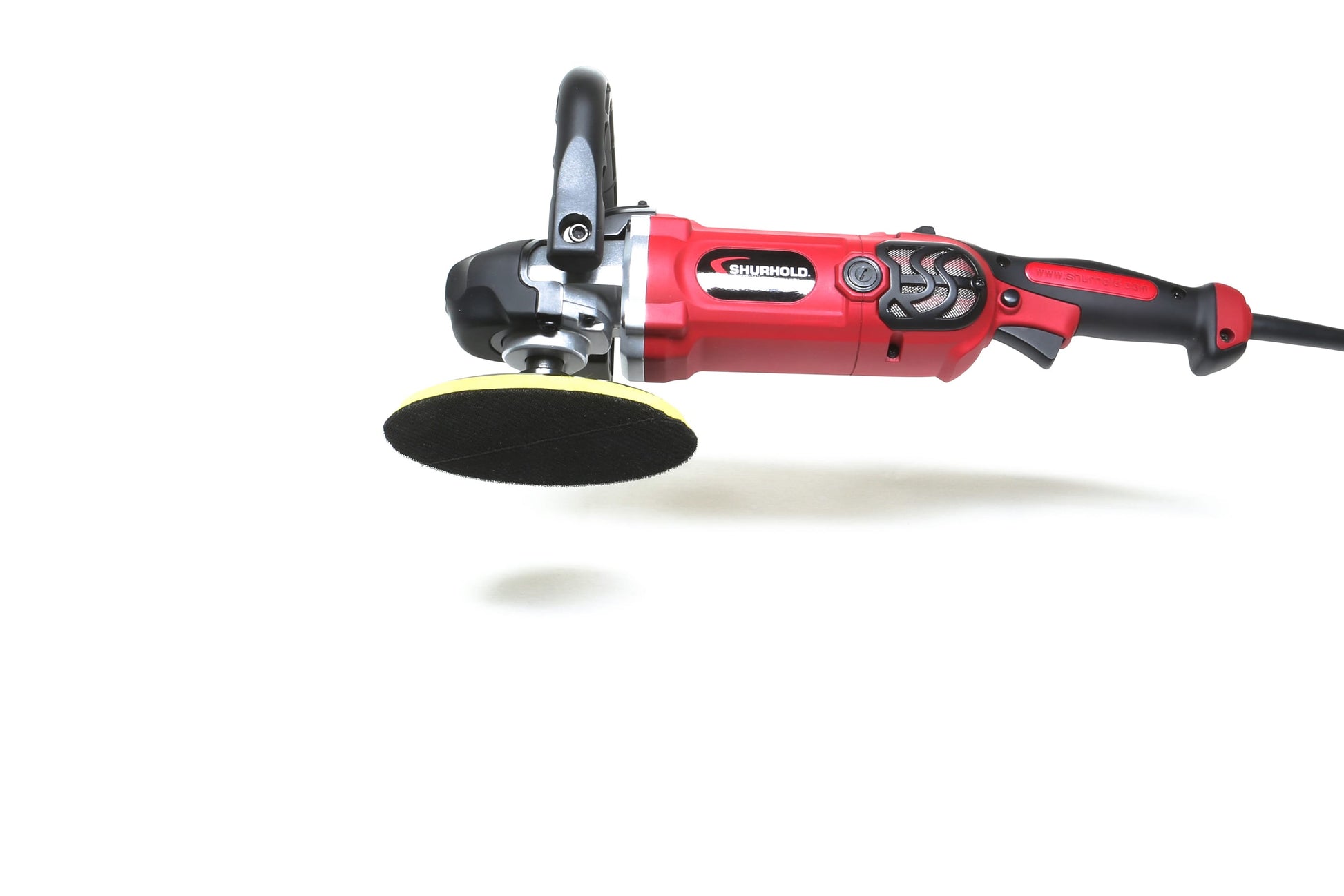 A red and black Refurbished Pro Rotary Polisher by Shurhold Industries, Inc. with a yellow-and-black sanding pad is displayed on a white background—this professional-grade tool efficiently addresses surface imperfections.