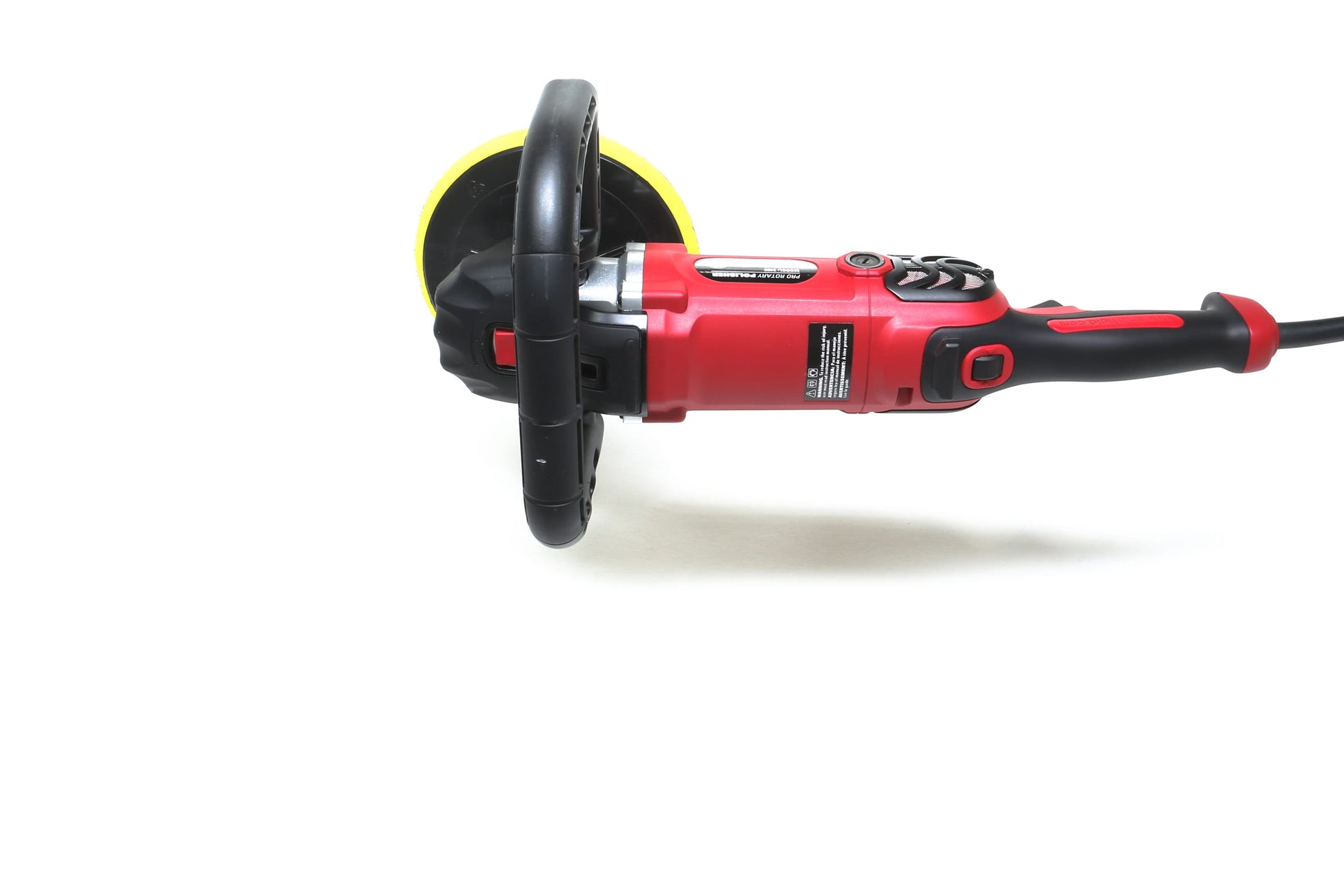 A red and black Refurbished Pro Rotary Polisher by Shurhold Industries, Inc. rests on a white surface with a visible yellow pad—ideal for expertly handling surface imperfections.