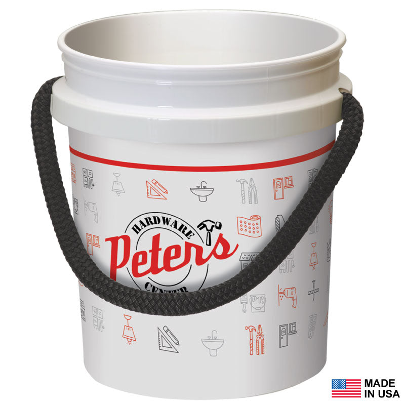 White bucket with a black rope handle, featuring the Peters Hardware logo and hardware-themed illustrations; Made in USA label in the corner.